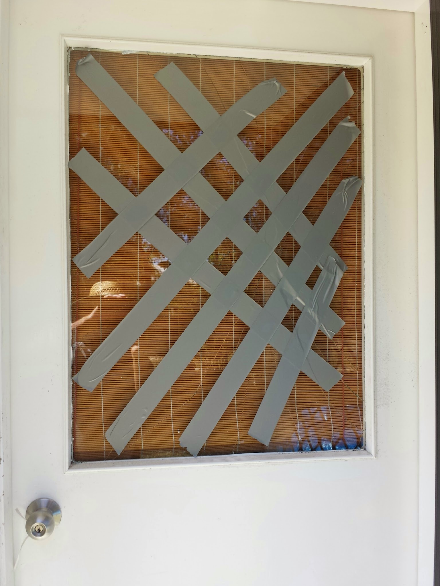 Glass door, taped for safety